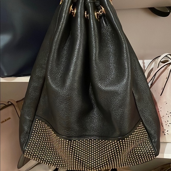 Badgley Mischka Black leather with Gold embellishments...